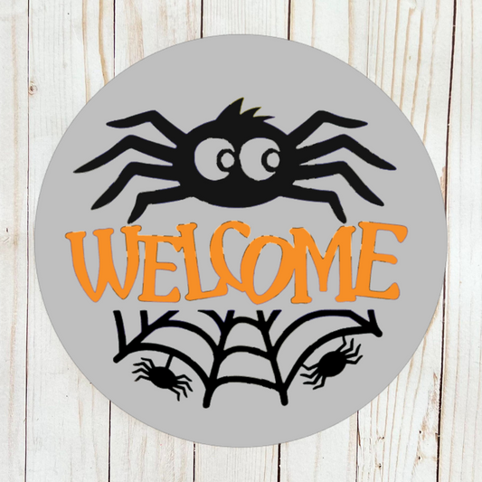 Halloween welcome sign with spiders and webs