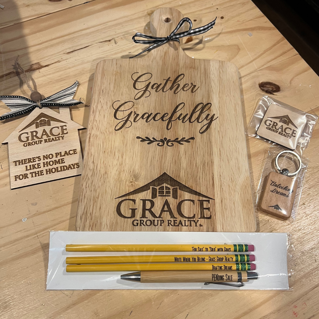 Custom branded corporate gift samples including personalized wood projects and laser-engraved items